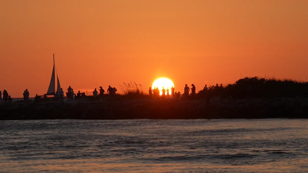 Fish dawn, take cover by 2 p.m., then fish again after dark.